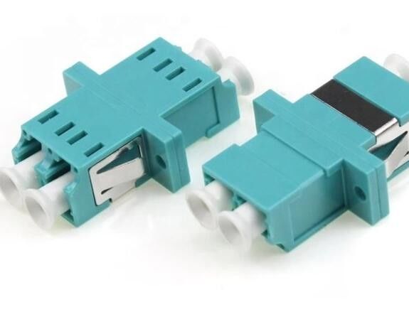 Lc al tipo adattatore duplex di plastica di simmetria dell'adattatore OM3 della fibra di Lc di UPC APC LC